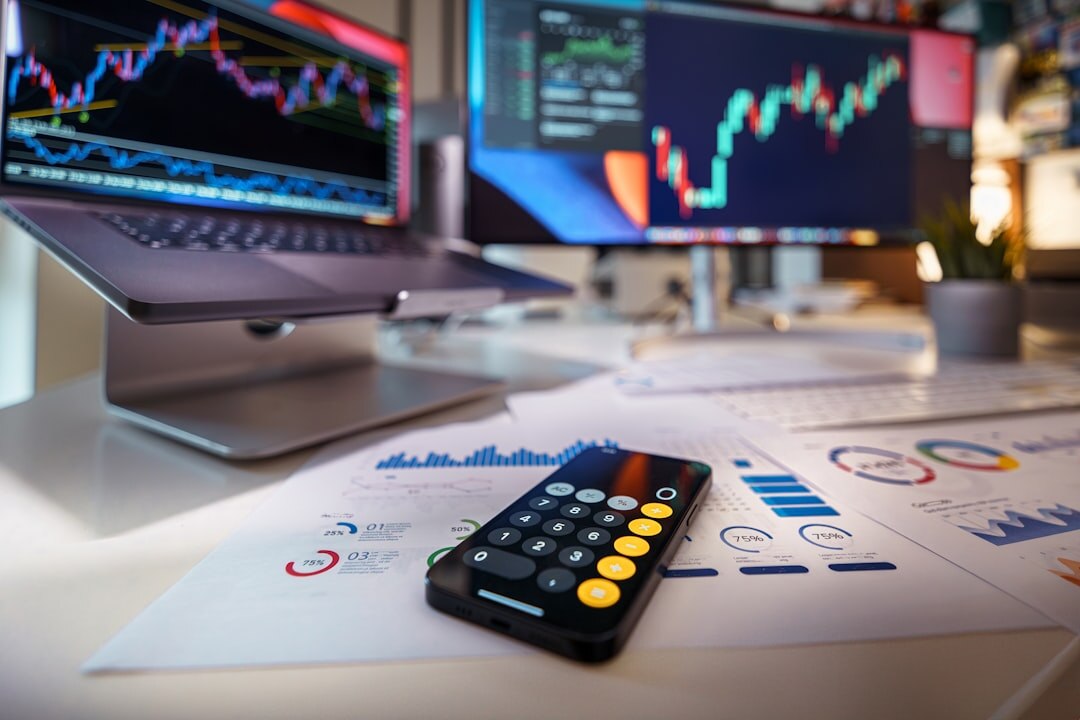 Business analytics charts and graphs displayed on a monitor